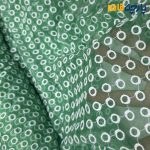 پارچه مجلسی تور کتان طرح دایره برجسته سبز روشن زمینه حریر اورگانز