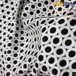 پارچه مجلسی تور کتان طرح دایره سفید و مشکی پر کار