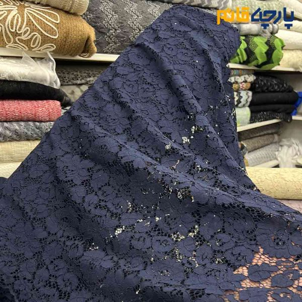 پارچه مجلسی دانتل کتان رنگ سرمه ای دو طرف حاشیه