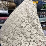 پارچه مجلسی دانتل کتان رنگ کرم طلایی دو طرف حاشیه
