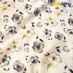 پارچه مجلسی سیلک ابریشم طرحدار خاص زمینه کرم روشن گل آبی نفتی دینز