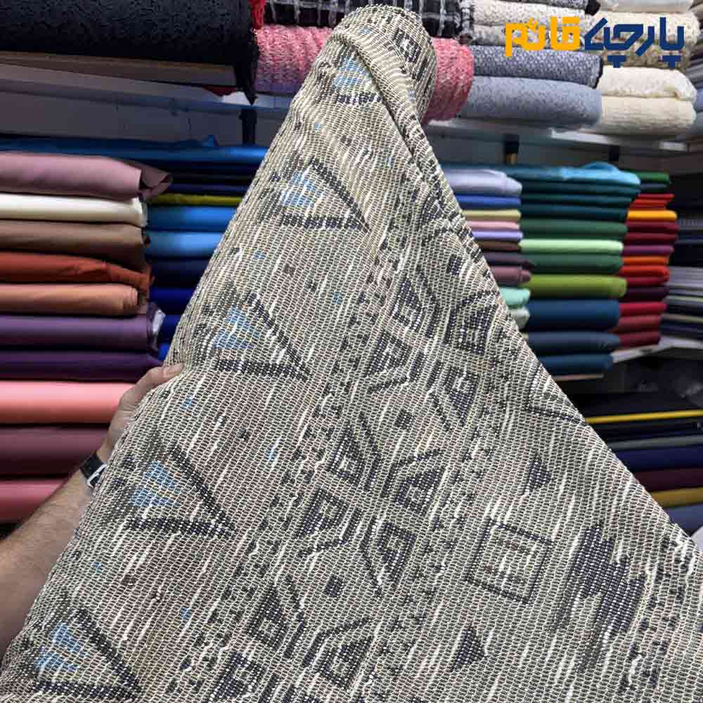 پارچه پاییزه و زمستانه بافت تریکو طرح موناکو رنگ کرم طلایی