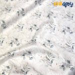 پارچه مجلسی سیلک ابریشم طرحدار زمینه سفید آفوایت طرح برگ سبز خطی
