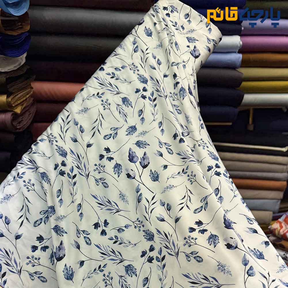 پارچه مجلسی سیلک ابریشم طرحدار طرح برگ آبی سرمه ای