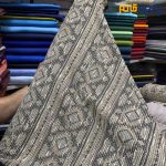 پارچه پاییزه و زمستانه بافت تریکو طرح موناکو ریز رنگ کرم طلایی با آبی