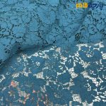پارچه مجلسی دانتل کتان رنگ سبز فیروزه ای دو طرف حاشیه