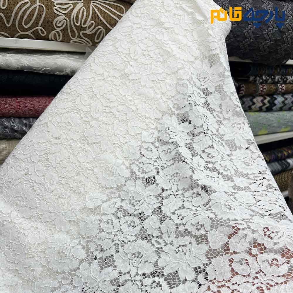 پارچه مجلسی دانتل کتان رنگ سفید دو طرف حاشیه